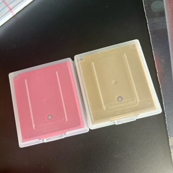 Custom (Pika) Gameboy advanced and Pokémon Red and Gold games.